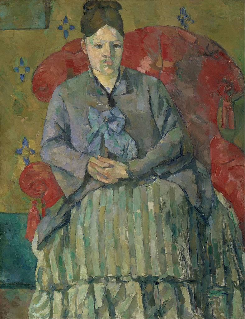 Portrait of Madame Cézanne in a red armchair.